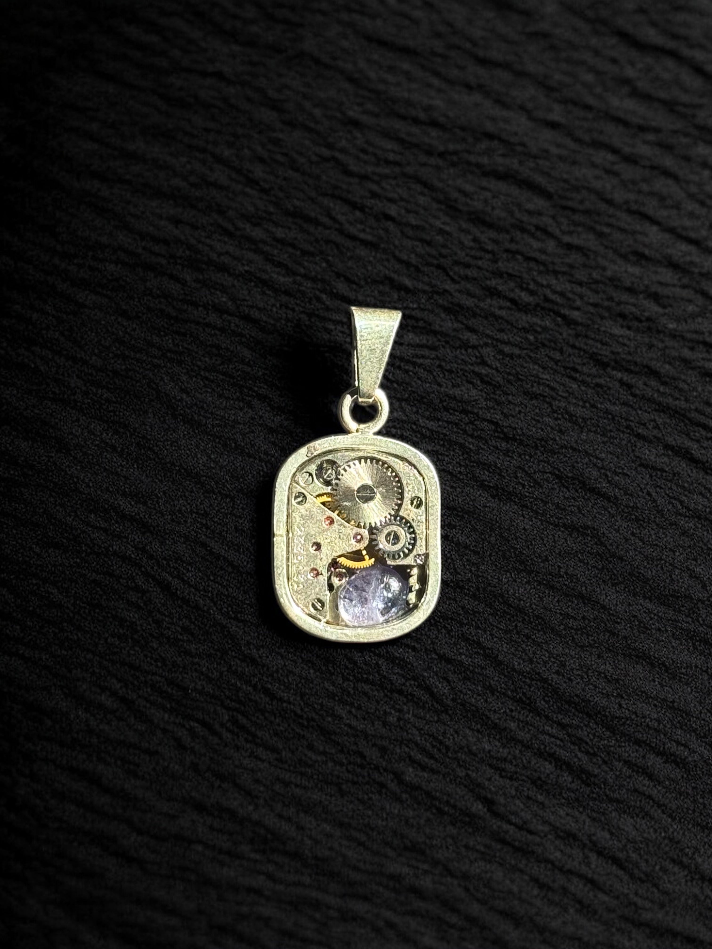 Dije reloj Tanzanita oval .3