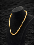 Collar de perlas naranjas