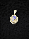 Dije reloj  Tanzanita marquis y cabujona
