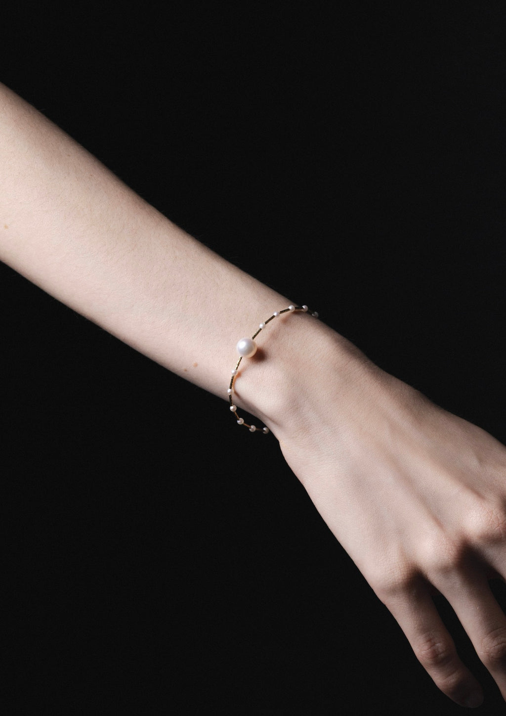 Pulsera oro con perlas