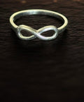 Anillo infinito oro blanco