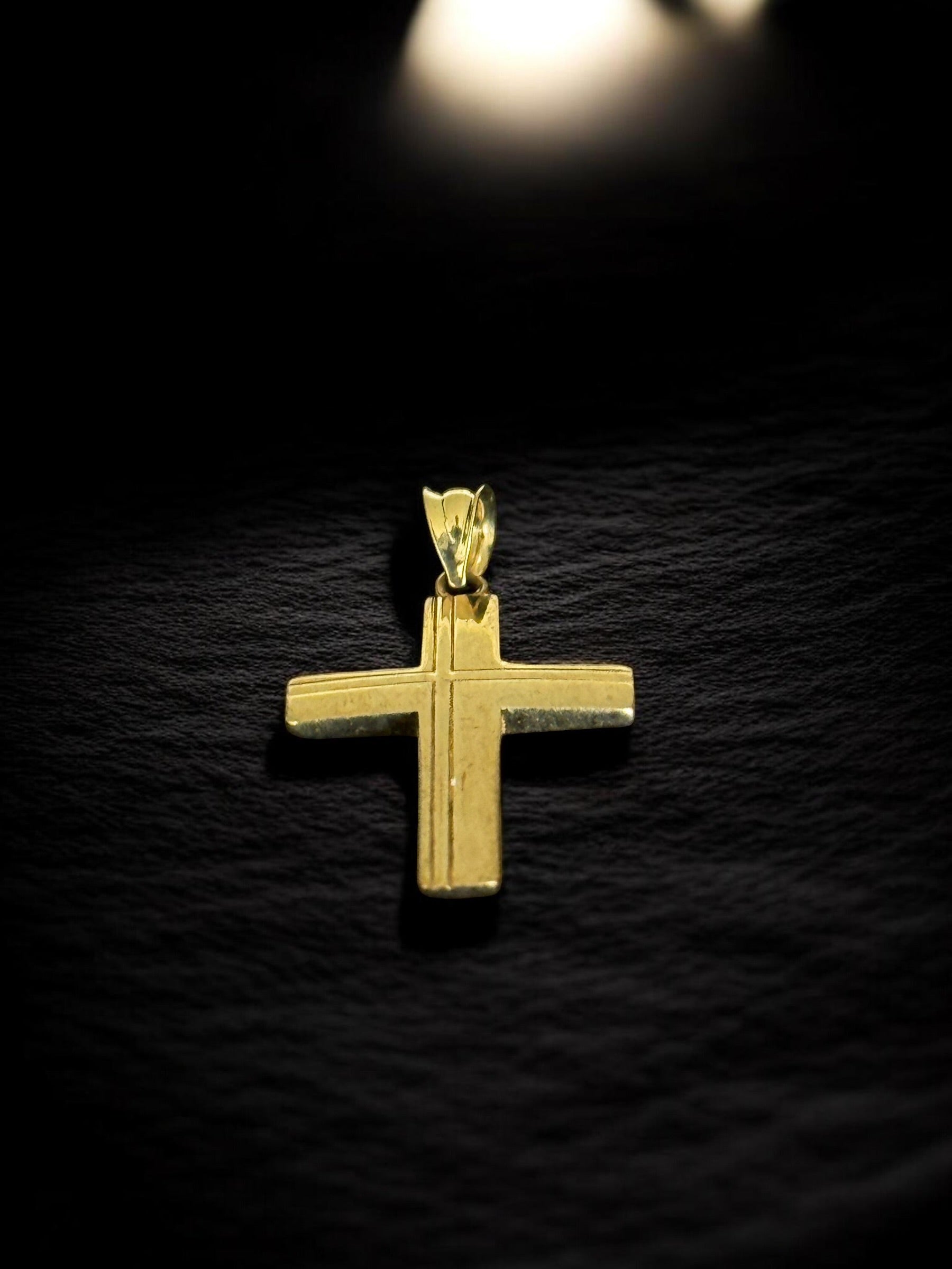 Cruz oro lineas