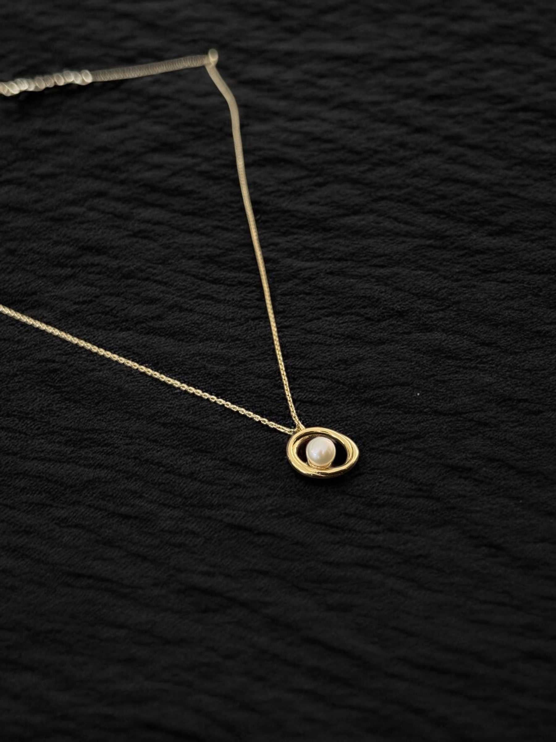 Collar perla en circulos oro