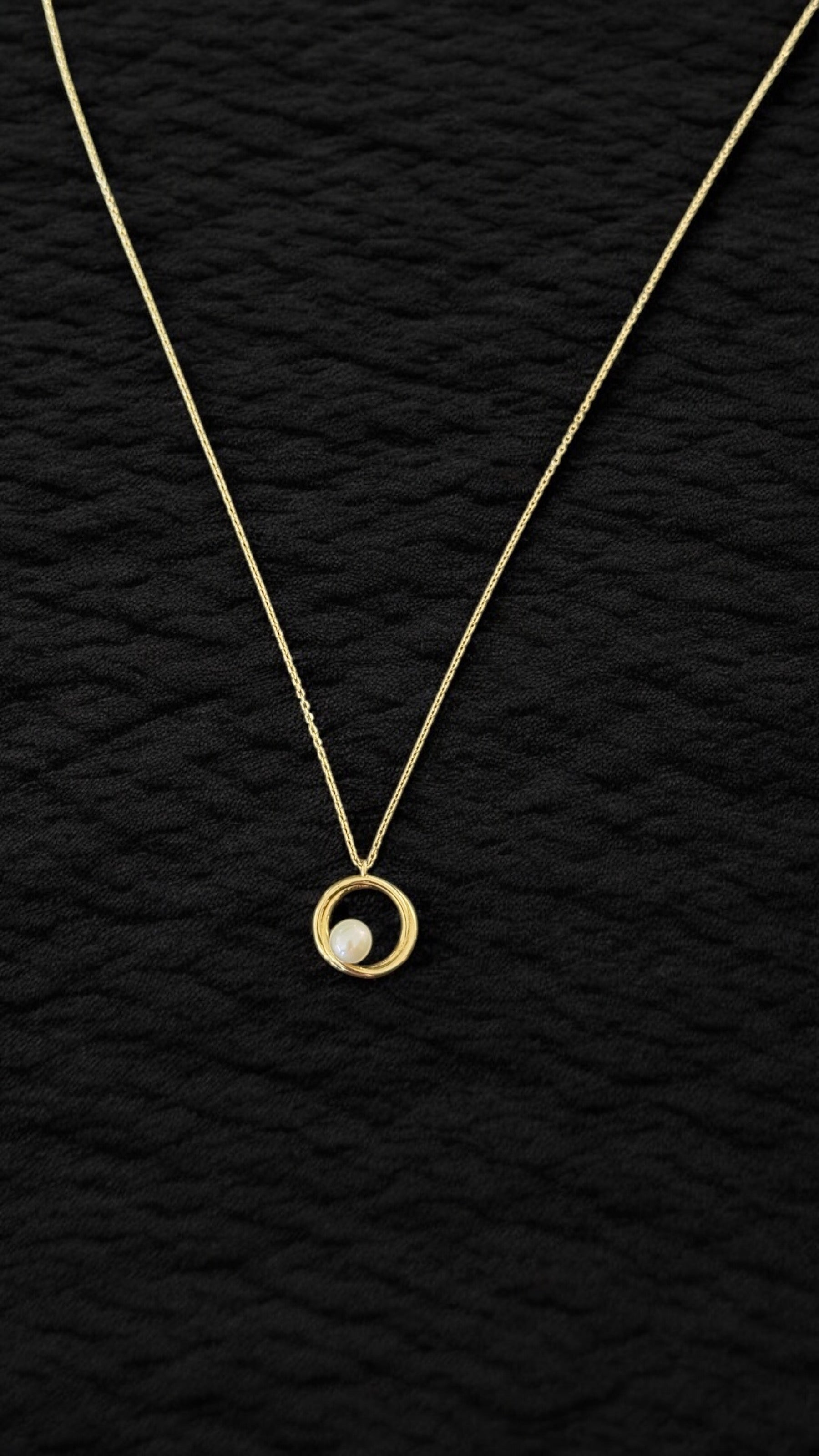 Collar perla en circulos oro
