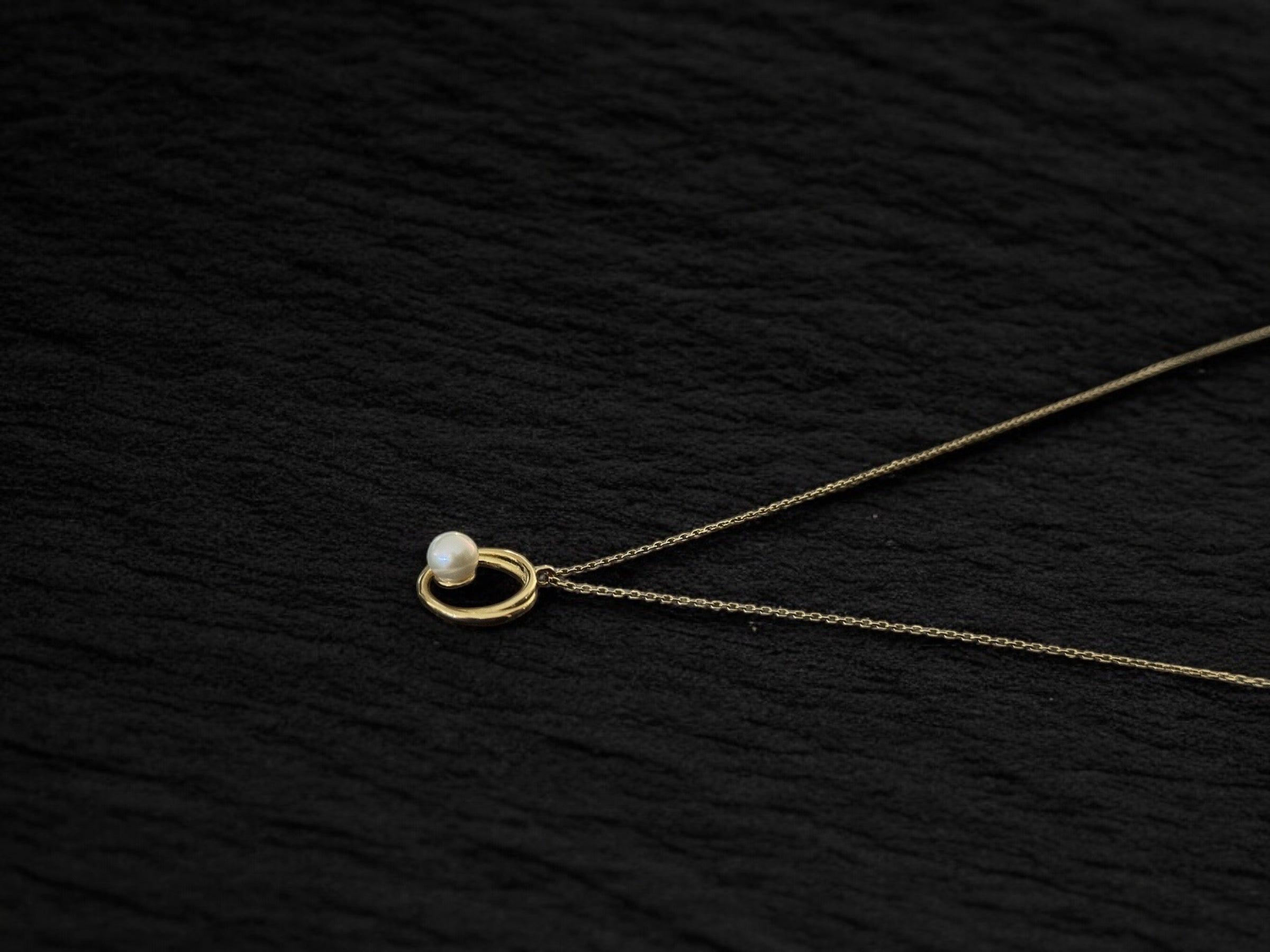 Collar perla en circulos oro
