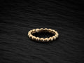 Anillo oro rosado bolas