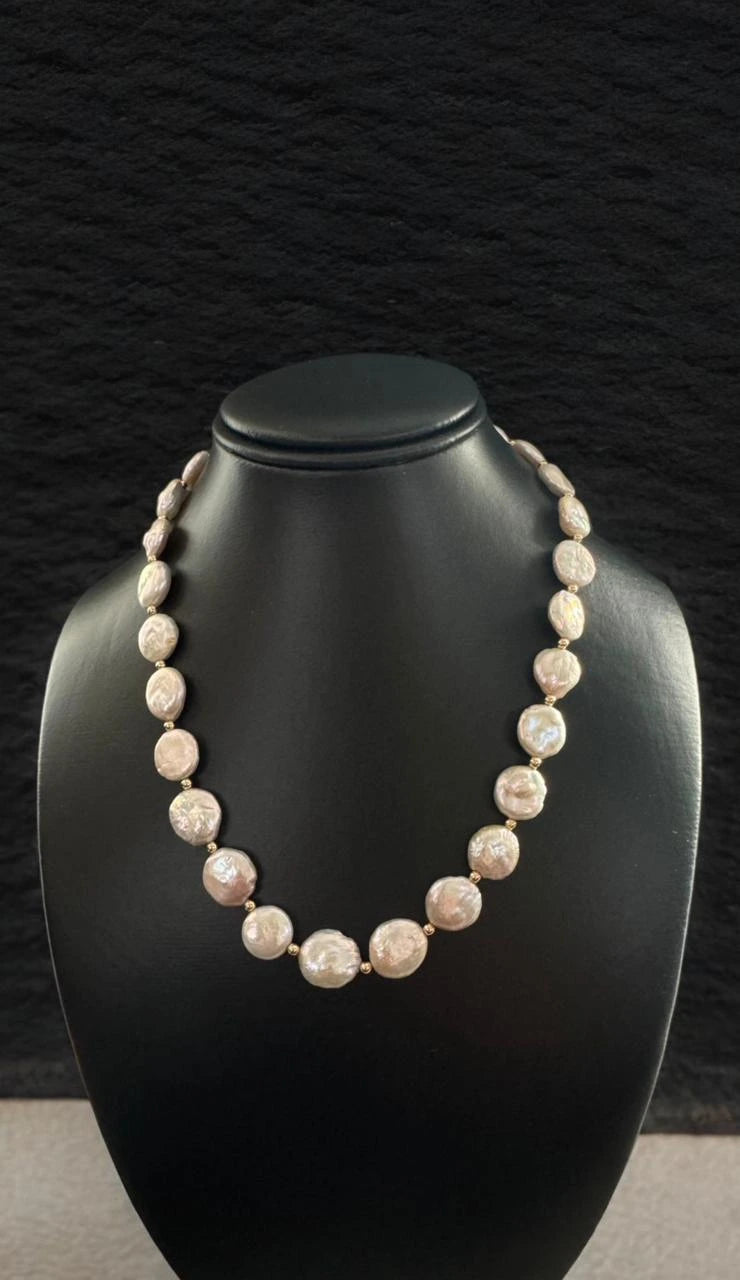 Collar de Perlas Coin