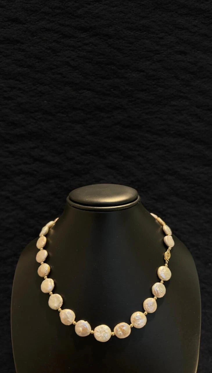 Collar de Perlas Coin