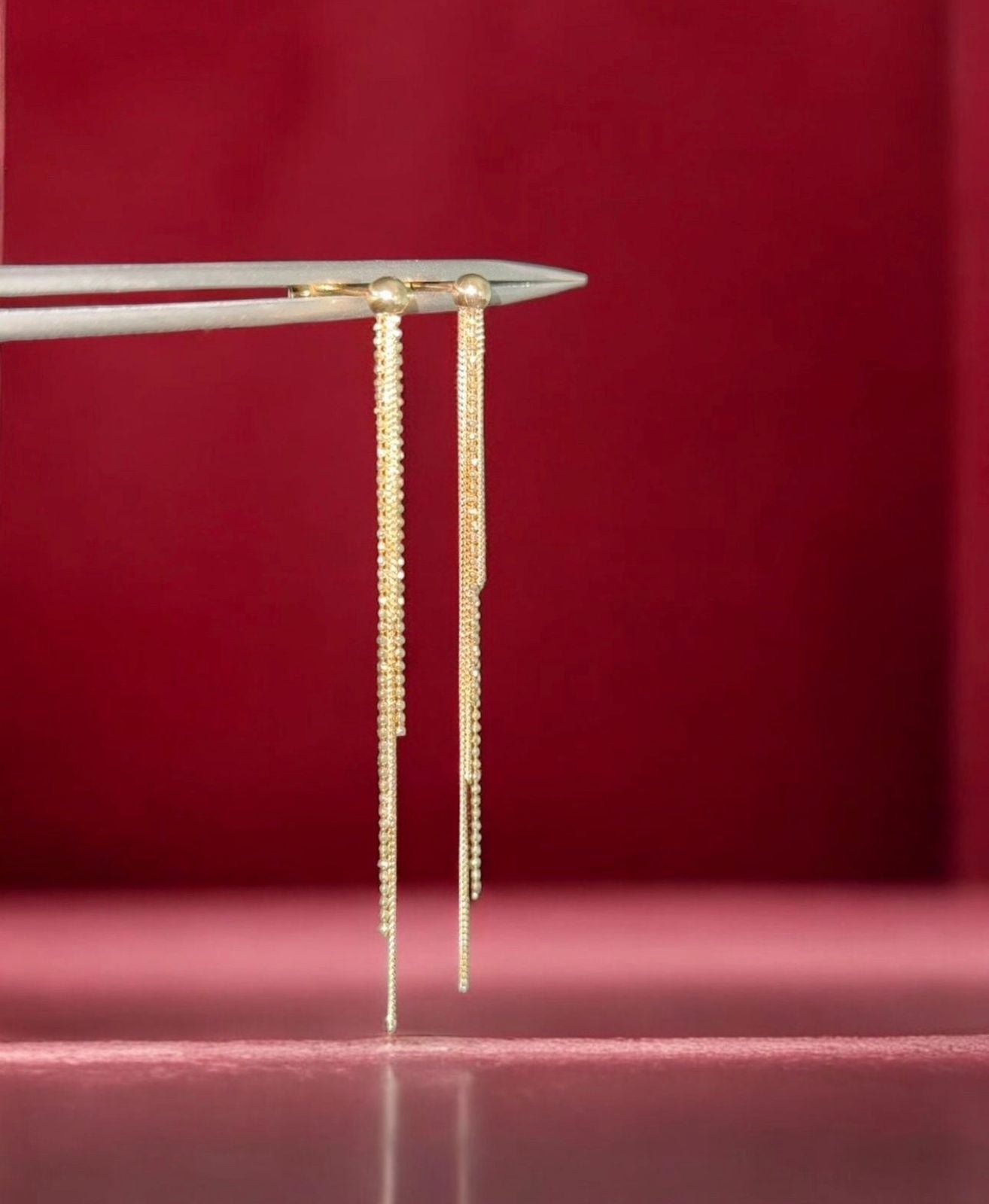 Aretes en oro largos