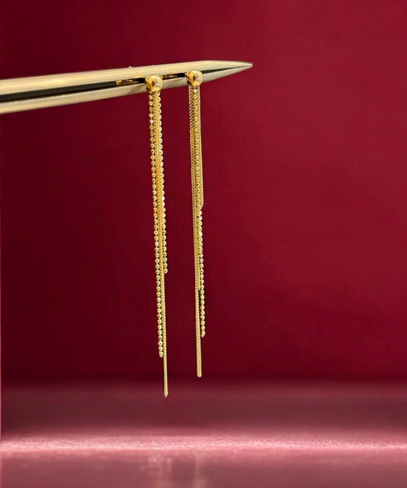 Aretes en oro largos